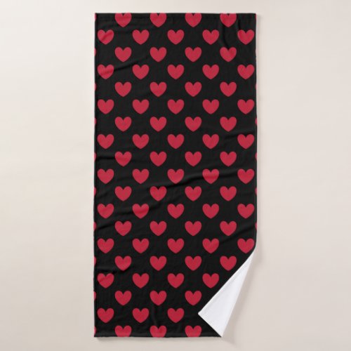 Red polka hearts on black bath towel