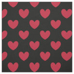 Red polka hearts on black fabric