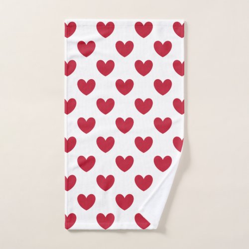 Red polka hearts on white hand towel 