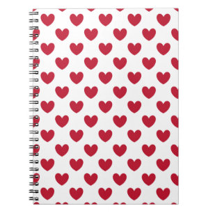 Red polka hearts on white notebook