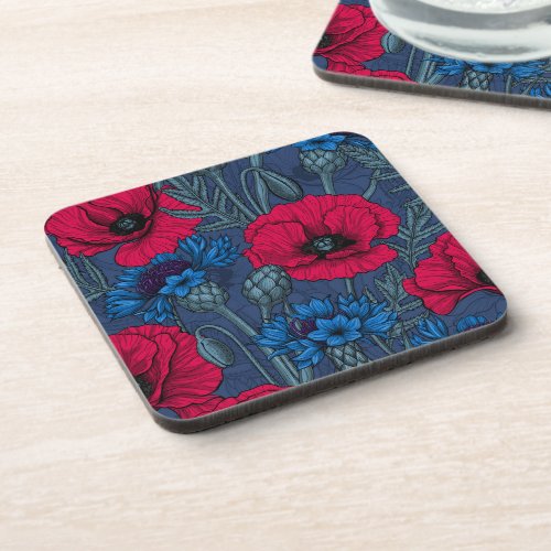 Red poppies and blue cornflowers on blue beverage coaster