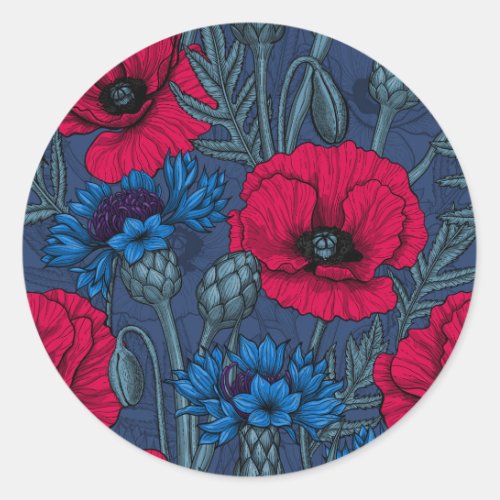 Red poppies and blue cornflowers on blue classic round sticker