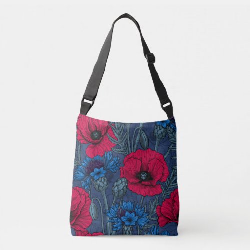 Red poppies and blue cornflowers on blue crossbody bag
