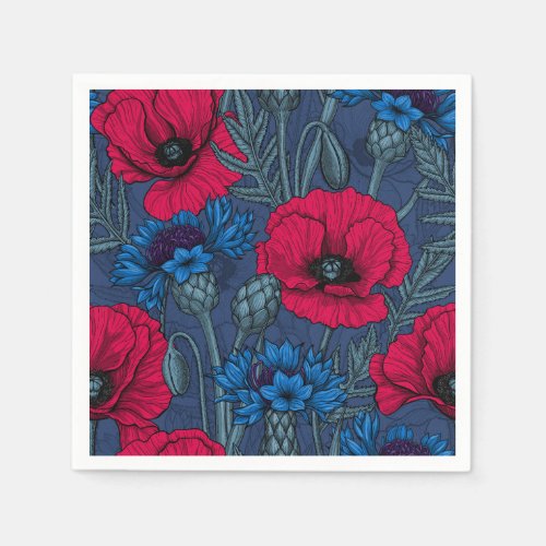 Red poppies and blue cornflowers on blue napkins