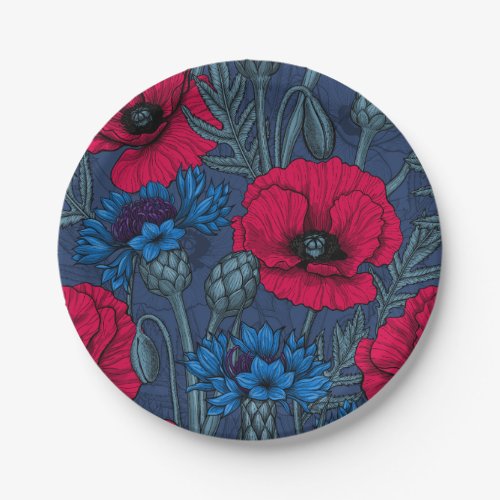 Red poppies and blue cornflowers on blue paper plates