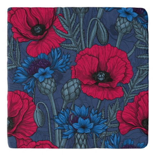 Red poppies and blue cornflowers on blue trivet