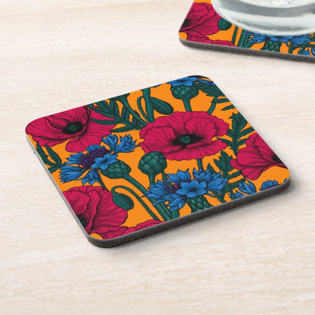 Red poppies and blue cornflowers on orange beverage coaster (Left Side)