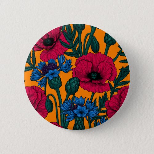 Red poppies and blue cornflowers on orange button