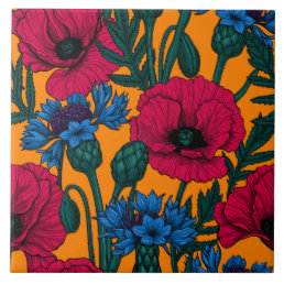 Red poppies and blue cornflowers on orange ceramic tile