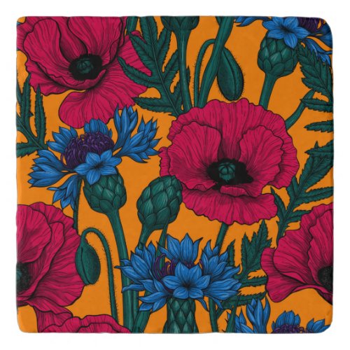 Red poppies and blue cornflowers on orange trivet