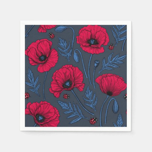 Red poppies and ladybugs on dark blue napkins