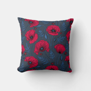 Red poppies and ladybugs on dark blue throw pillow
