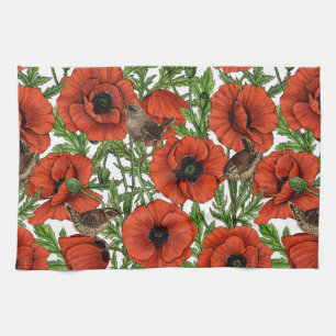 Red poppies and wrens, green leaves on white kitchen towel