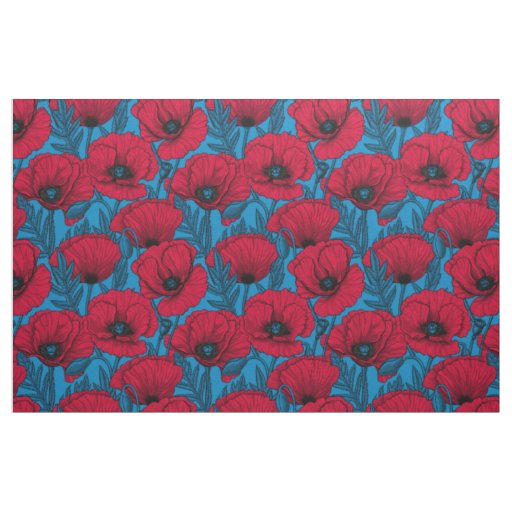 Red poppy garden on blue fabric