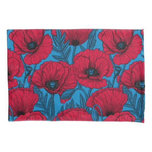 Red poppy garden on blue pillow case