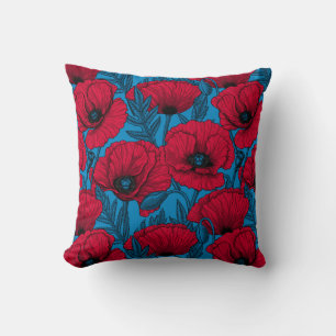 Red poppy garden on blue throw pillow