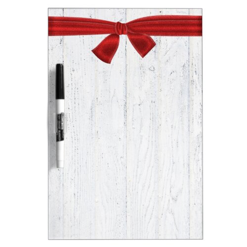red ribbon on whitewashed wood dry erase board