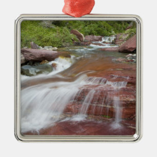 Red rock in Baring Creek in Glacier National Metal Ornament