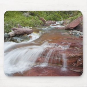 Red rock in Baring Creek in Glacier National Mouse Pad