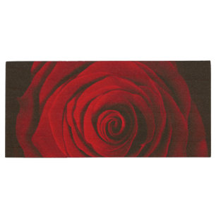 Red rose on black background vintage effect wood flash drive