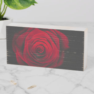Red rose on black background vintage effect wooden box sign
