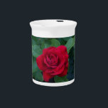 Red Rose Up Close Beverage Pitcher<br><div class="desc">The flower fills the entire frame and the details of its petals, stem, and leaves are very clear and sharp. The rose has a vibrant, deep red color with darker shades around the edges of the petals, and the center of the flower is a slightly lighter shade of red. The...</div>