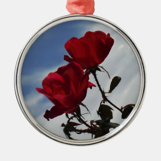 Red Roses Against a Bright Blue Sky Metal Ornament (Front)