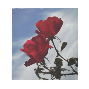Red Roses Against a Bright Blue Sky Notepad