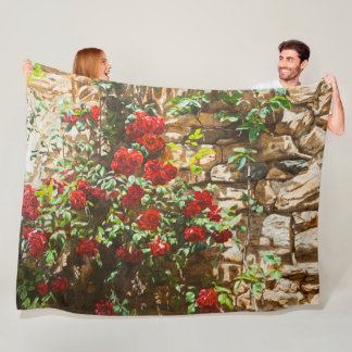 Red Roses Against a Stone Wall Fleece Blanket