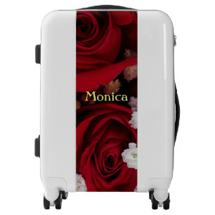red roses and baby's breath flowers luggage