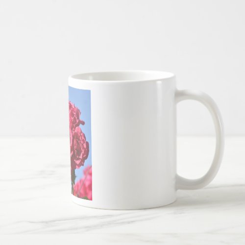 Red roses on blue sky coffee mug