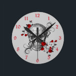Red Roses Skull Wall Clock<br><div class="desc">Black and white sketch of a skull with beautiful red roses and black swirls all around it. This would make an awesome addition to your game room, or college dorm room or anywhere in the house!</div>
