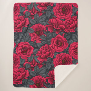 Red roses with gray leaves on black sherpa blanket