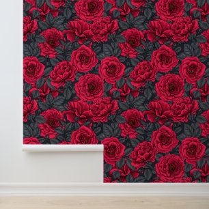 Red roses with gray leaves on black wallpaper