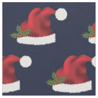 Red Santa Hat With Christmas Holly On Blue Fabric