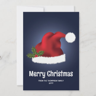 Red Santa Hat With Christmas Holly On Blue Holiday Card