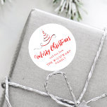Red Silver Ribbon Tree Merry Christmas Script Classic Round Sticker<br><div class="desc">This modern holiday sticker features a red and silver faux foil ribbon Christmas tree sprinkled with silver faux glitter,  and the words "Merry Christmas" in stylish red calligraphy script. Personalize it with your family's name in serif font.</div>