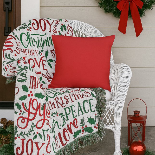  Red Solid Color Outdoor Pillow (“Add festive red to your porch with this cozy pillow perfect with holiday throws to welcome guests.”)