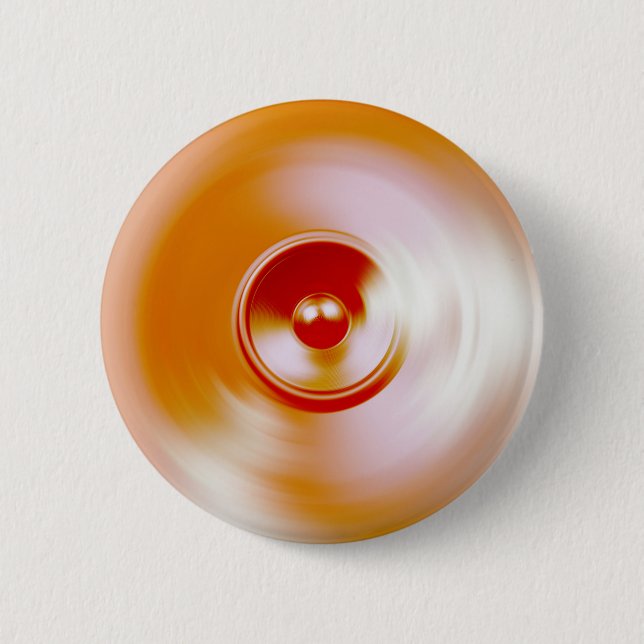 Red spinning music speaker button (Front)