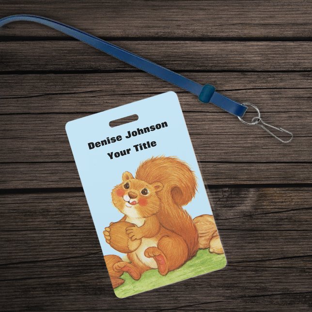 Red Squirrel Eating Nuts Sitting in Grass Blue Sky Badge (Cute red squirrel with stash of acorns and nuts in grass on blue ID plastic badge.)