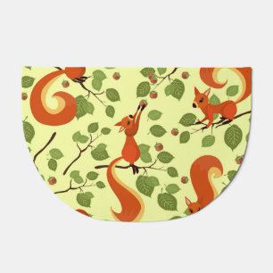 Red squirrel in hazel branches. doormat