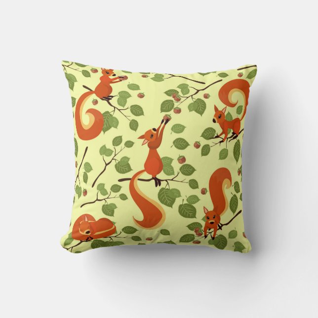 Red squirrel in hazel branches. throw pillow (Front)