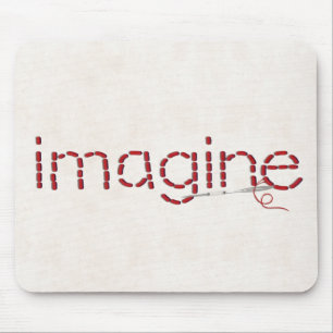 red stitched imagine text message with needle mouse pad