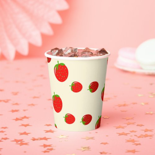 Red strawberry on pink paper cups