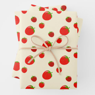 Red strawberry pattern on pale pink wrapping paper sheets