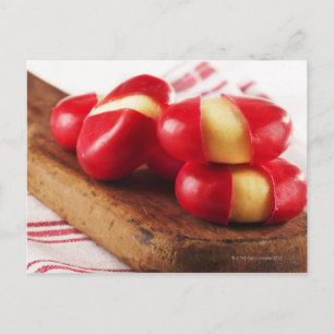 Red striped tea towel in background. postcard