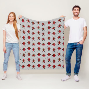 Red suit astronauts on gray fleece blanket