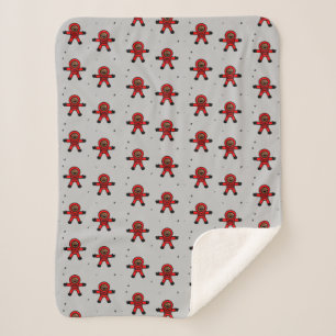 Red suit astronauts on gray  sherpa blanket