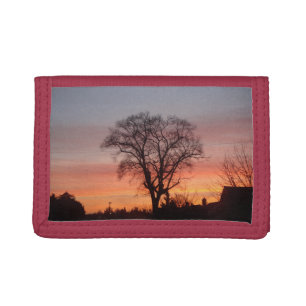 red sunset sky black silhouette trees tri-fold wallet