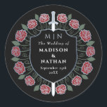 Red Sword Shield Medieval Fantasy Monogram Wedding Classic Round Sticker<br><div class="desc">Invite your wedding guests with this Royal Sword & Shield Medieval Fantasy Monogram design. This design is perfect for couples seeking a regal, yet modern-day medieval fantasy aesthetic. Personalize the text, font, and colors to suit your design preferences. Matching Items in our shop for a complete party theme. The silver...</div>